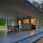 Modern Dogtrot House in Charlottesville Virginia has Open-Air Covered Porch that Links the Public and Private Wings.